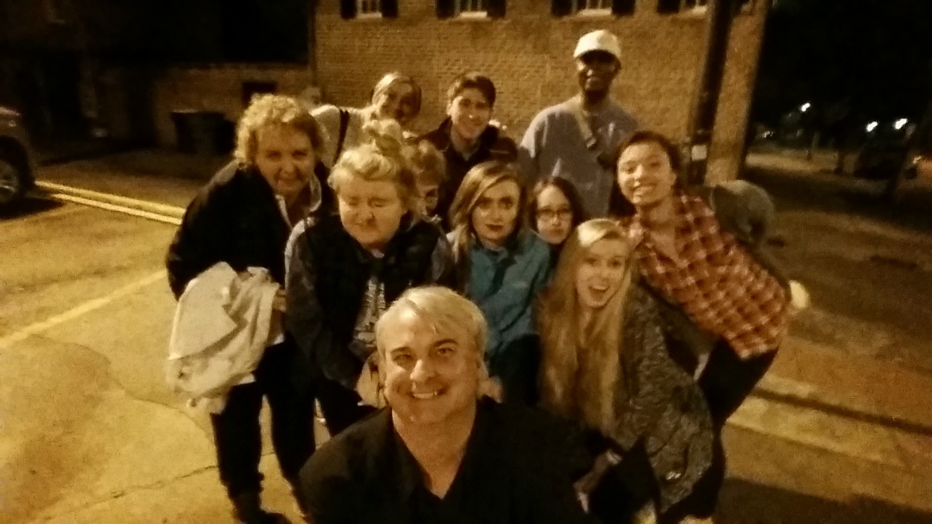 Patrick Burns with Savannah ghost tour group at night