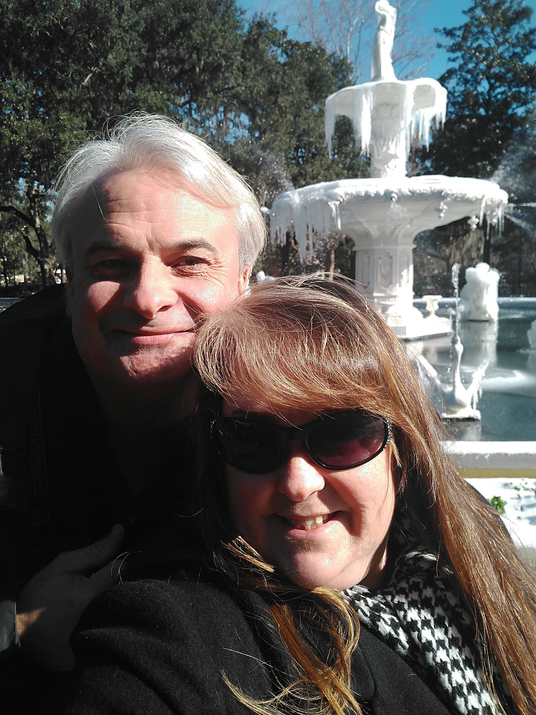 Patrick Burns and Marley Gibson in front of the frozen Forsyth Park fountain during the rare Savannah winter storm of January 2018